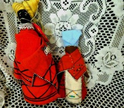 2 NATIVE AFRICAN CLOTH DOLLS, 11" & 9" ORANGE WOOL FELT CAPES, BEADS, HEADDRESS
